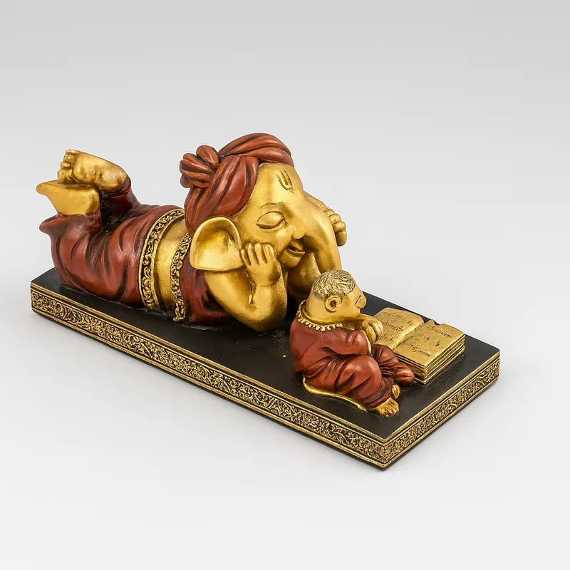 Sleeping Lord Ganesha Reading Book Showpiece – Resin Ganpati Idol for Home Décor